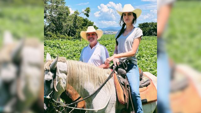 Mariara e seu pai na área de agricultura da fazenda. Foto: Acervo pessoal
